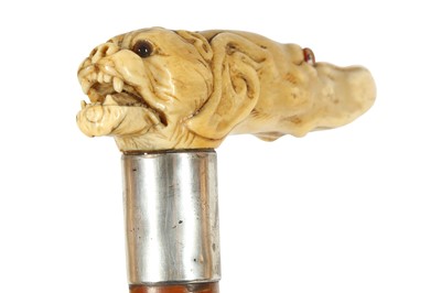 Lot 254 - A CARVED MARINE IVORY HANDLED WALKING CANE, 19TH CENTURY