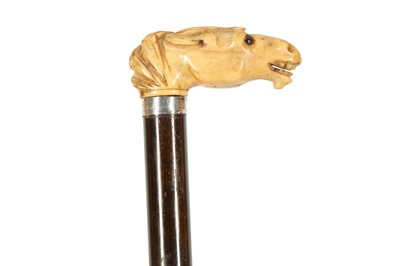 Lot 251 - A CARVED MARINE IVORY WALKING CANE, 19TH CENTURY