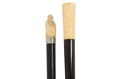 Lot 256 - TWO CARVED BONE HANDLED WALKING CANES, EARLY 20TH CENTURY