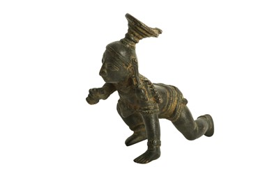 Lot 227 - A CRAWLING BALA KRISHNA BRONZE STATUETTE