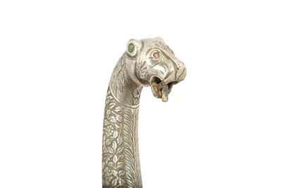 Lot 133 - A SILVER-INLAID LION-HEADED STEEL DAGGER (KHANJAR)