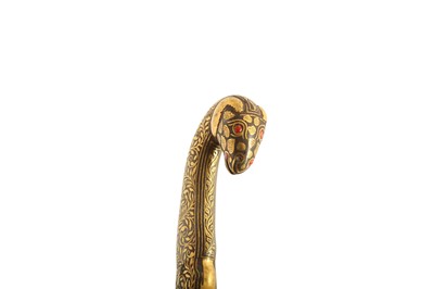 Lot 134 - A GOLD-DAMASCENED (KOFTGARI) RAM-HEADED STEEL DAGGER (KHANJAR)