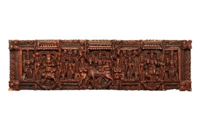 Lot 264 - A CARVED WOODEN PANEL WITH SHAIVITE FIGURAL DECORATION