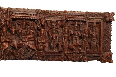 Lot 264 - A CARVED WOODEN PANEL WITH SHAIVITE FIGURAL DECORATION