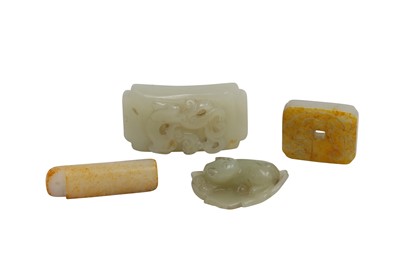 Lot 750 - THREE CHINESE PALE CELADON JADE PENDANTS AND A 'CAT' CARVING.