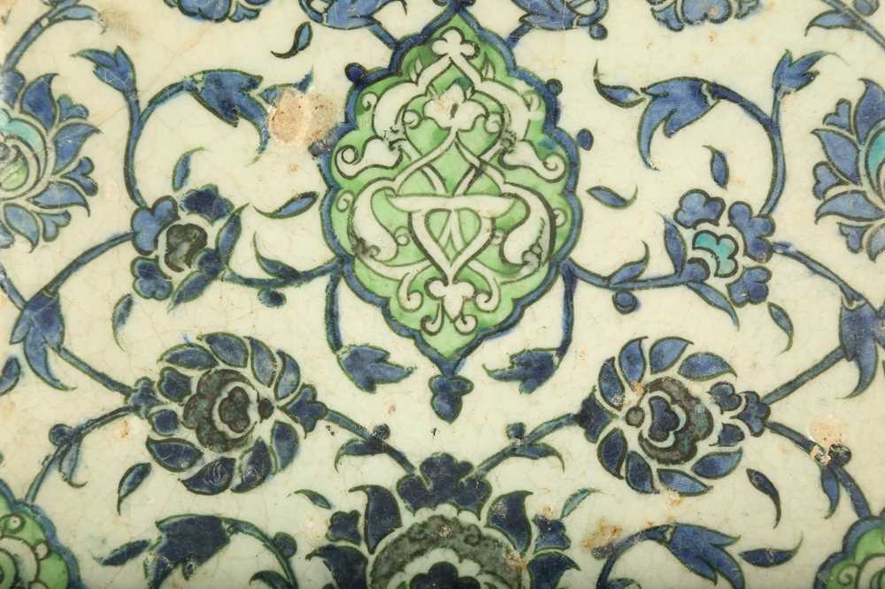 Lot 58 - A SQUARE DAMASCUS POTTERY TILE WITH ARABESQUE