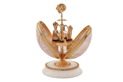 Lot 63 - A late 19th century French gilt metal mounted mother of pearl 'palais royale' sewing necessaire, circa 1880