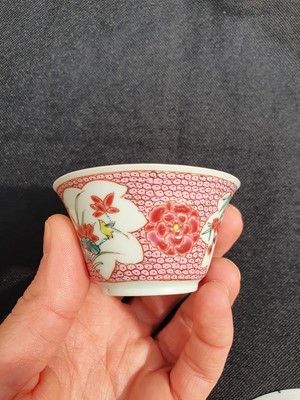 Lot 260 - A CHINESE FAMILLE ROSE 'LADY AND BOY' CUP AND SAUCER.