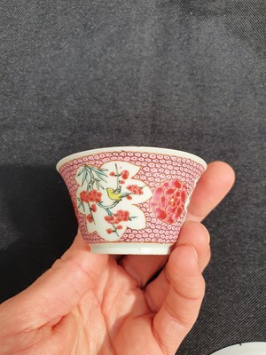 Lot 260 - A CHINESE FAMILLE ROSE 'LADY AND BOY' CUP AND SAUCER.