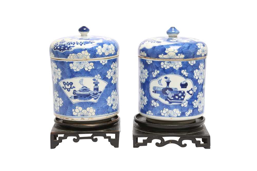 Lot 163 - A NEAR-PAIR OF CHINESE BLUE AND WHITE JARS AND COVERS.