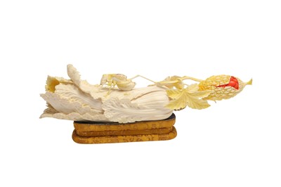 Lot 469 - λ A CHINESE IVORY 'CABBAGE' CARVING.