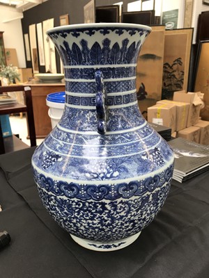 Lot 585 - A CHINESE BLUE AND WHITE 'BAJIXIANG' VASE.