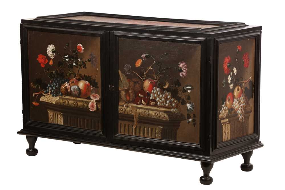 Lot 116 - A NORTH EUROPEAN PAINTED AND EBONISED TABLE CABINET, THIRD QUARTER 17TH CENTURY