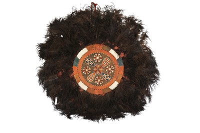 Lot 360 - A NATIVE AMERICAN LEATHER CEREMONIAL SHIELD, 20TH CENTURY
