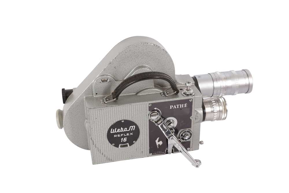 A Pathe Webo M 9.5mm Cine Camera, motor runs, body G, some light paint