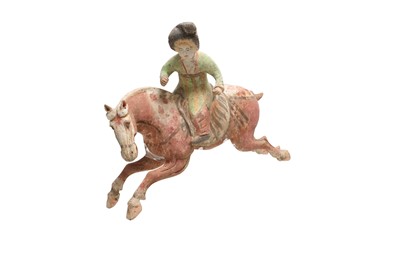 Lot 231 - A CHINESE POTTERY FIGURE OF A POLO PLAYER.