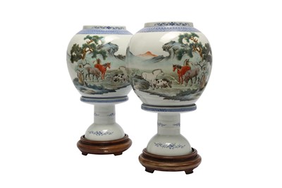 Lot 566 - A PAIR OF FAMILLE ROSE 'EIGHT HORSE' LANTERNS.