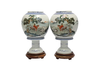 Lot 566 - A PAIR OF FAMILLE ROSE 'EIGHT HORSE' LANTERNS.