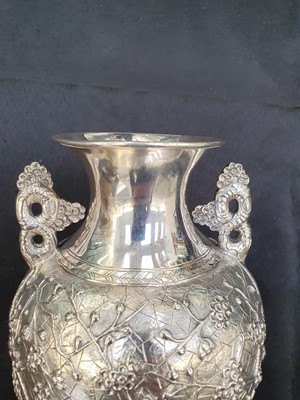 Lot 776 - A CHINESE SILVER 'PRUNUS' VASE, BY WANG HING.