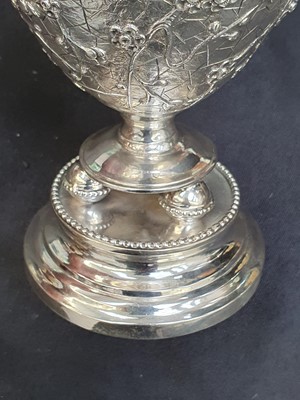 Lot 776 - A CHINESE SILVER 'PRUNUS' VASE, BY WANG HING.