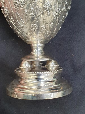 Lot 776 - A CHINESE SILVER 'PRUNUS' VASE, BY WANG HING.