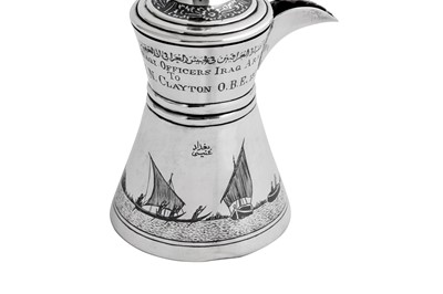 Lot 308 - An early 20th century Iraqi silver and niello Turkish coffee pot (cezva), Baghdad dated 1928 signed Baghdad Onaisi (Onaisi Al Fayyadh)