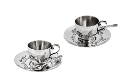 Lot 307 - A pair of early 20th century Iraqi silver and niello cups and saucers, Baghdad circa 1928 probably by Baghdad Onaisi (Onaisi Al Fayyadh)
