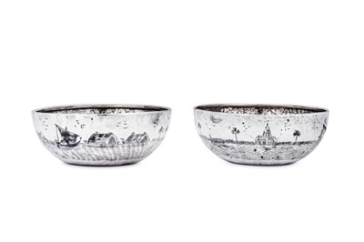 Lot 301 - A pair of mid-20th century Iraqi silver and niello bowls, Basra circa 1950