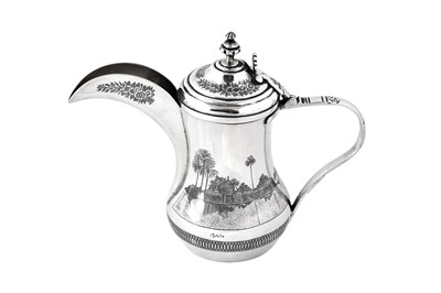 Lot 306 - An early 20th century Iraqi silver and niello Dallah coffee pot, circa 1930, signed Omara, Amer, Raheem