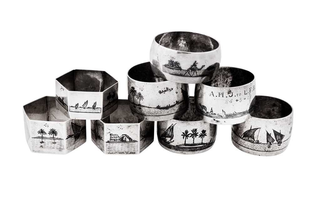 Lot 279 - A mixed group of eight early 20th century Iraqi silver and niello napkin rings, circa 1920-40
