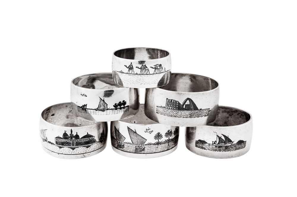 Lot 278 - A mixed group of six early 20th century Iraqi silver and niello napkin rings, circa 1920-40