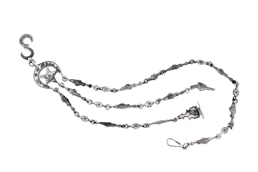 Lot 273 - An early 20th century Iraqi silver and niello watch chain chatelaine, circa 1920