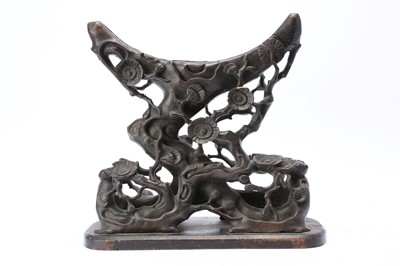 Lot 130 - A CHINESE WOOD 'PRUNUS' STAND.