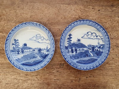 Lot 80 - A CHINESE BLUE AND WHITE 'DESHIMA ISLAND' DISH, TOGETHER WITH A JAPANESE VERSION OF THE SAME DISH.