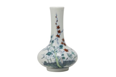 Lot 942 - A CHINESE DOUCAI 'THREE FRIENDS OF WINTER' BOTTLE VASE.