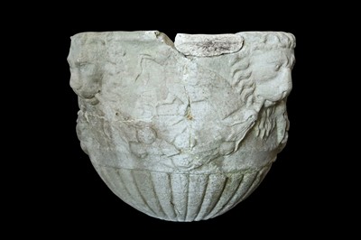 Lot 35 - A 15TH / 16TH CENTURY ITALIAN CARVED MARBLE VESSEL DECORATED WITH LION MASKS AND BIRDS