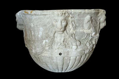 Lot 178 - A 15TH / 16TH CENTURY ITALIAN CARVED MARBLE VESSEL DECORATED WITH LION MASKS AND BIRDS