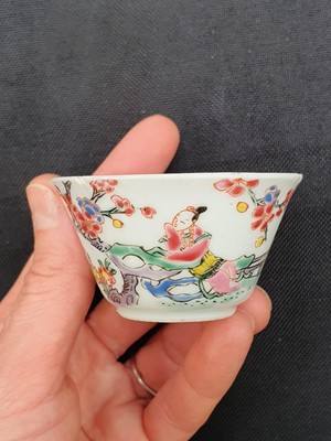 Lot 74 - A PAIR OF CHINESE FAMILLE ROSE 'LOVERS' CUPS AND SAUCERS.