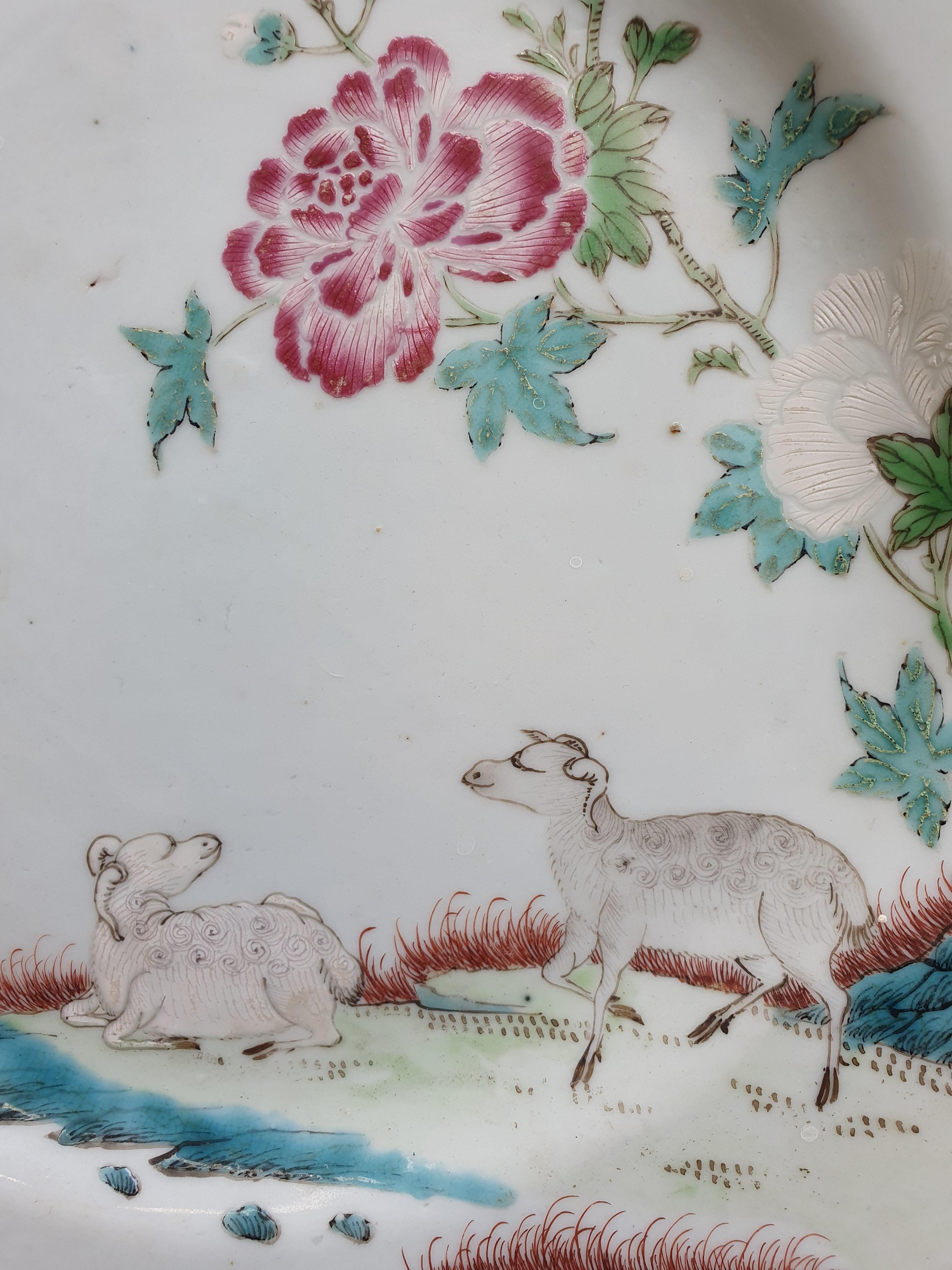 Lot 79 A CHINESE FAMILLE ROSE 'GOATS' DISH.