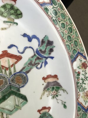 Lot 441 - A LARGE CHINESE FAMILLE VERTE 'TREASURES' DISH.