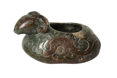 Lot 306 - A CHINESE GREEN JADE 'RAM' WASHER