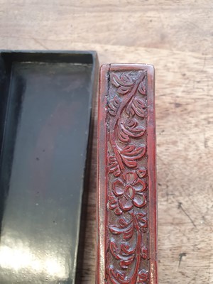 Lot 16 - A CHINESE CINNABAR LACQUER RECTANGULAR SCROLL BOX, COVER AND LINER.