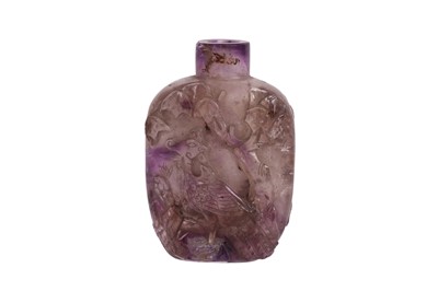 Lot 647 - A CHINESE CARVED AMETHYST SNUFF BOTTLE, 19TH CENTURY