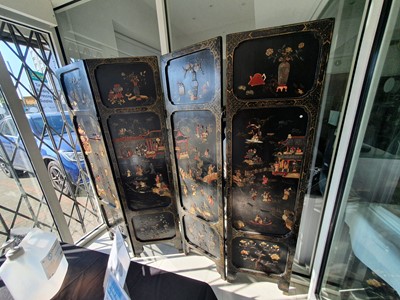 Lot 174 - A CHINESE HARDSTONE-INLAID LACQUER WOOD FOUR-FOLD SCREEN.
