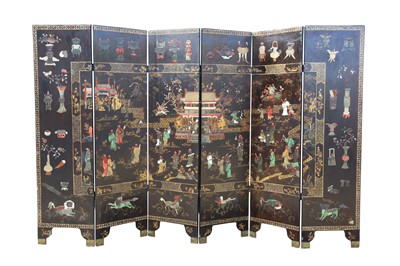 Lot 112 - A CHINESE HARDSTONE-INLAID LACQUER WOOD SIX-FOLD 'IMMORTALS' SCREEN.