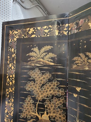 Lot 110 - A CHINESE GILT-LACQUER WOOD FOUR-FOLD SCREEN.