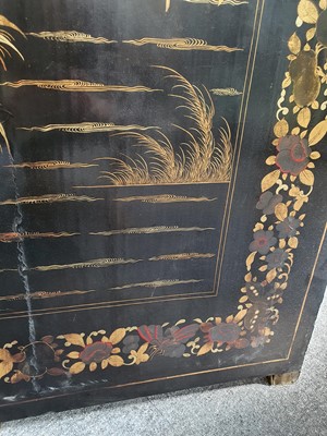 Lot 110 - A CHINESE GILT-LACQUER WOOD FOUR-FOLD SCREEN.