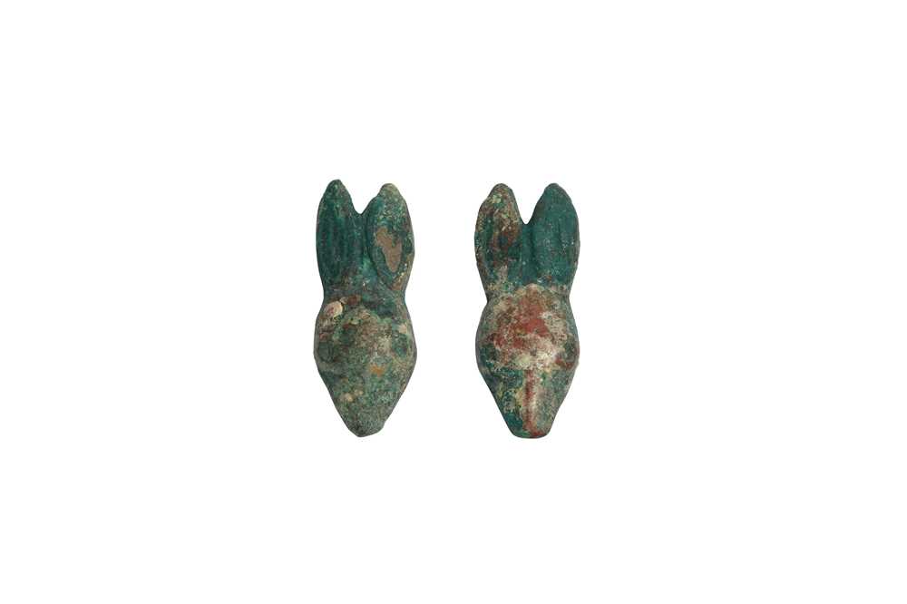 Lot 223 - A PAIR OF CHINESE BRONZE RABBIT HEAD ORNAMENTS.