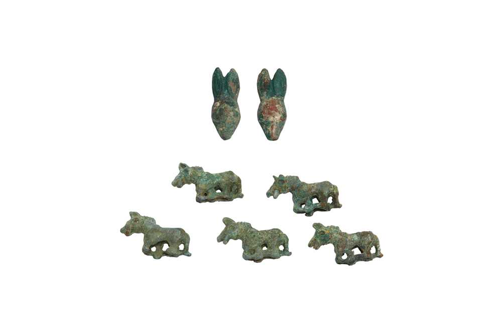 Lot 17 - A PAIR OF CHINESE BRONZE 'RABBIT' HAT ORNAMENTS AND FIVE SMALL CHINESE BRONZE 'HORSE' ORNAMENTS.