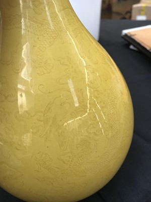 Lot 472 - A CHINESE LEMON-YELLOW ANHUA-DECORATED 'DRAGON' VASE.